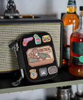 EDC Pocket Organizer Pouch With DIY Patches Area nylon utility pocket on shelf with colorful patches and tactical motif.