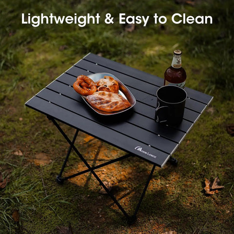 Ultralight Folding Camping Table With Carry Bag A Must Have For Outdoor Cooking And Picnics Portable Compact Setup For Camp Boat Or Travel Sturdy Aluminum That Holds Up To 66 Lbs In Any Terrain with food and drink outdoors