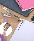 Twenty Piece Metal Handheld Single Hole Punch Set One Quarter Inch Eight Sheet Capacity for crafts, greeting cards, notebooks.