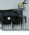 SS5GL2 Micro Limit Switch 125 VAC 5A hinged roller momentary snap action black pack of 5 close-up with ruler for scale