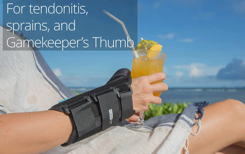 Woman by the beach wearing Formfit Thumb Spica Brace For DeQuervain's Tendonitis, Arthritis, And Gamekeeper's Thumb, left hand, medium size.