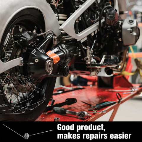 Motorcycle repair setup with tools and springs showing use of 40 Pack Stainless Steel Tiny Torsion Springs For DIY Repair Woodworking And Hair Clip Replacements 0.01 Inch Wire Diameter 0.16 Inch Outside Diameter Six Turn Coils Light Duty.