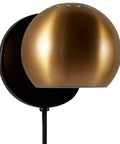 Gold Mid Century Modern Wall Mounted Plug In Sconce 7.25 Inch Height Cool Finish Vibe Ready To Highlight Hallways Or Gallery Walls Sleek Metal Design For Ambience And Accent Lighting In Living Rooms, featuring a polished gold metal dome.