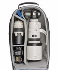 Open Streetwalker Rolling Camera Backpack With Dedicated Laptop Pocket And Minimalist Black Exterior showing organized camera gear