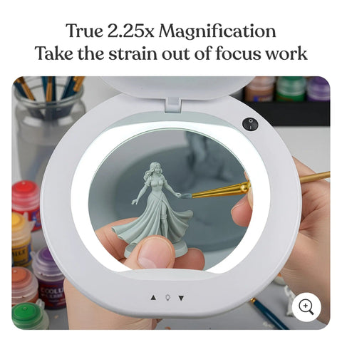 Close-up of XL Pro Grade Magnifying Desk Lamp With Clamp Showing 2.25x Zoom for Detail on Crafting Figurine