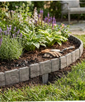 Interlocking Faux Stone Garden Edging Border Kit Easy Install Plastic Landscape Border For Yard Flower Beds And Lawn Weather-Resistant 30 Pack Included surrounding a flower bed