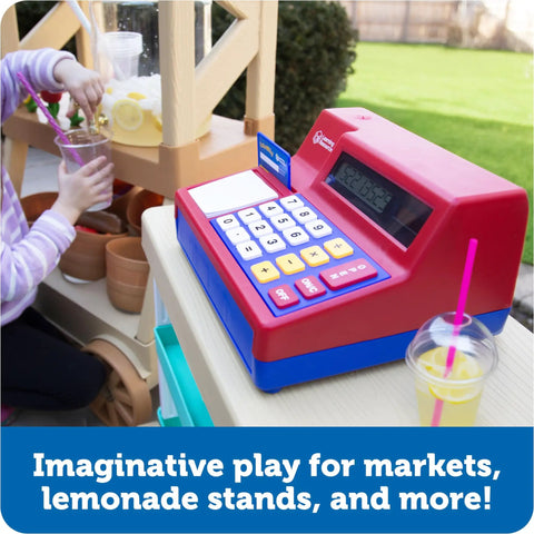 Pretend And Play Calculator Cash Register Toy For Kids And Toddlers With Solar Powered Calculator next to child making lemonade