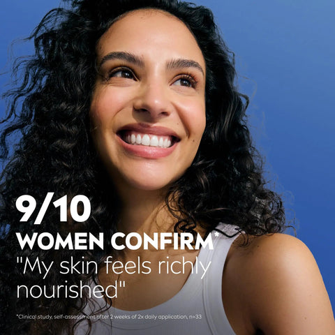 Happy woman with glowing skin smiling, highlighting satisfaction with Game Changer Cocoa Butter Body Lotion For Crispy Dry Skin With Hyaluronic Acid And 72 Hour Deep Hydration To Melt Away Flakiness Reveal A Natural Glow And Leave Your Complexion Feeling Like Velvet All Day Long In A 16 9 Oz Tube.