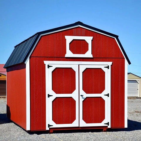 Red barn-style shed with white trim doors using Beefy Four Pack 4 Inch T Strap Hinges Heavy Duty Outdoor Hinges for Wood Gates Barn Fence Shed Doors Black Finish With 270 Degree Rotation And Universal 2mm Thick 6 Hole Construction.