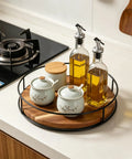 9 Inch Acacia Wood Lazy Susan Turntable With Iron Frame 360 Degree Rotation Grippy Non Slip Base Keeps Spices Condiments And Pantry Essentials Spinning Smoothly On Cabinets Or Countertops For Grab-And-Go Access And Organization displaying jars and bottles