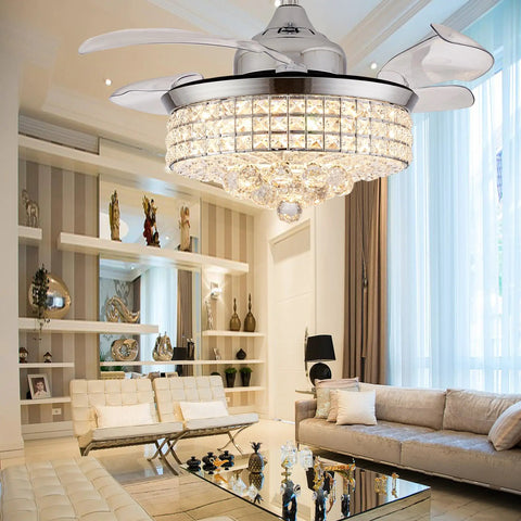 36 Inch Crystal Fandelier Ceiling Fan With Lights Retractable Invisible Modern Chandelier Ceiling Fan Remote Control Chrome Finish Six Speeds Three Color Options Ideal For Bedroom Or Living Room That Is Lit in a living room setting