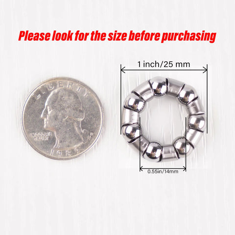 Beefy One Inch Bicycle Ball Bearings Set For Front And Rear Hubs With Seven Steel Balls In A Fixed Cage beside a quarter