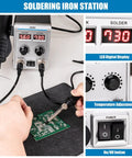 Person using 2 In 1 Soldering Station With SMD Hot Air Rework, LED Dual Digital Display, Heat Gun And Solder Iron Kit