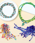Colorful beaded necklaces and bracelets with glass bugle beads bulk 4200 pcs 2x6mm champagne pink long tube seed beads on display
