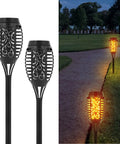 Front and installed view of 4 Pack Solar Tiki Torch Lights With Flickering Flame IP65 Waterproof Outdoor Solar Powered Pathway Garden