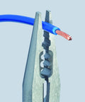 Six And A Quarter Inch Electricians Four In One Pliers gripping blue wire with exposed ends for stripping