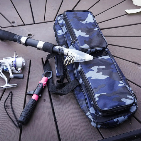 17 Inch Fishing Tackle Carrier Bag With Two Front Pockets Travel Large Capacity Rod Case on wooden deck with fishing gear.