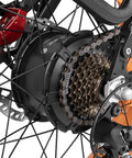 Close-up of the rear hub motor and gears of the Blue Fat Tire Electric Bike For Epic Mountain Trails And Smooth City Cruising.