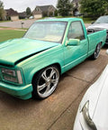 Rich Jade Green Basecoat Paint Gallon Drop In Ready To Spray applied on this pickup truck with chrome rims in suburban setting.