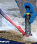 Worker installing Unfinished One And One Quarter Inch All Thread Rod Thirty Six Inch Long Seven TPI UNC Coarse in concrete