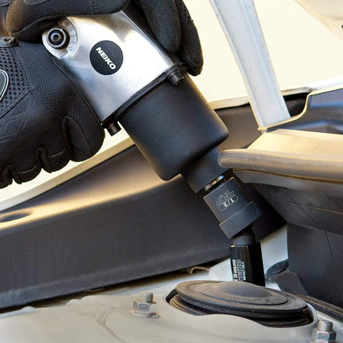 Using Beefy 1/2-Inch Drive Impact Extension Bar And Adapter Set with wrench on car engine for heavy-duty application
