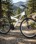 27.5 Inch Mountain Bike For Adults With Dual Suspension And 18 Speeds on mountain trail, High Carbon Steel Frame, Off Road White.