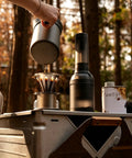 Kick Up Your Daily Brew Game With This Portable Electric Coffee Grinder Featuring 45 Precision Settings And Stainless Steel Conical Burrs A Straight Up Game Changer For Espresso Pour Over Drip Or Cold Brew Creations All Day, portable grinder in outdoor setup.