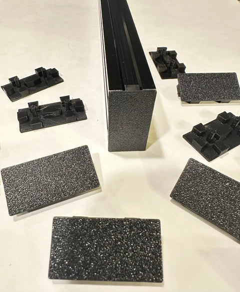 15 Piece End Caps For 2040 Aluminum Extrusion Rails 20x40mm T Slot shown beside fitted rail, textured, thick construction