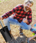 Person holding a Two Pack All Steel D Grip Shovels With 13 Inch Blades And Removable Footpads For Digging on a garden plot