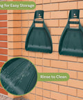 Leaf Scoops Hand Rakes For Easy Leaf Cleanup And Mulch Spreading Ultra Lightweight Yet Durable Grabber Tool hanging on wall