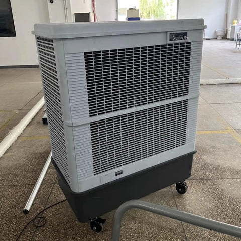 Built Tough Shop Grade Evaporative Air Cooler With Three Speed Fan Blades And Roll Away Casters For Garage Warehouse Cooling Massive 160 Liter Water Tank Swamp Chiller Unit in gray with vents.