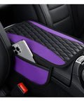 Patchwork Leather Center Console Covers For Cars with side storage pocket featuring purple and black design, phone stored inside.