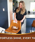 Woman cleaning leather chair with 3in1 Leather Cleaner Wipes Extra Large 8x10 For Car And Home Leather Care Heavy Duty