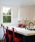 36 Inch White Corner Kitchen Cabinet With Dual Lazy Susan Spin Shelves And Smooth Operator Soft Close Doors Big Time Storage Solutions No Nonsense Daily Setup in modern kitchen setting with red chairs.