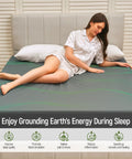 Woman relaxing on Grounding Sheets Queen Size With 10 Percent Silver Fiber And 90 Percent Organic Cotton Fitted Deep Pocket Kit.
