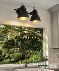 Industrial Style Bathroom Vanity Lights Two Light Wall Sconce Mounted Over Mirror Black Metal Frame Fixture That Brings Killer Industrial Ambiance To Your Space And Can Be Installed Up Or Down For Maximum Versatility And Style in a kitchen setting.