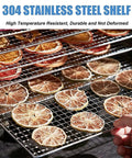 Straight Up Reliable Commercial Food Dehydrator With 12 Slick Trays For Making Jerky And Drying Fruits Vegetables And Nuts featuring a stainless steel shelf loaded with dried citrus slices.