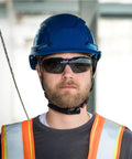 Worker wearing MX300 Safety Glasses With Anti Fog Lenses ANSI Z87 Plus 100 Percent UV Protection CBR65 Blue Light Blocking Lenses