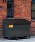 Heavy Duty Dumpster Cover Waterproof 12 Oz Material With No Fuss Elastic Corner Edges Keeps Trash Can Top Safe From Rain Snow Sun And Dirt Dimensions 48 By 36 By 6 Inches 100 Percent Weather Resistant Patio Cover With Logo Customization on dumpster next to brick wall.