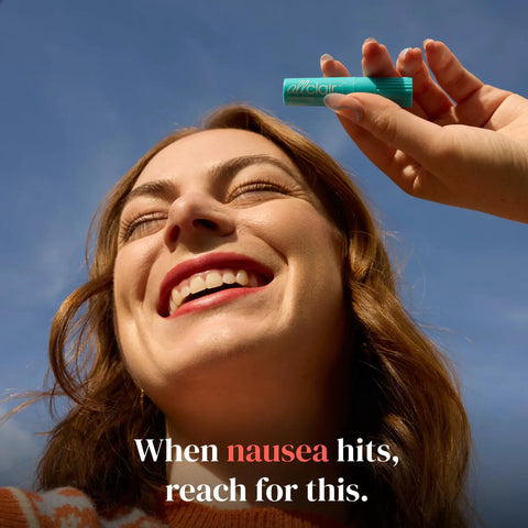 Person holding Motion And Morning Sickness Nausea Relief Inhaler No Pills Needed Fast Acting Drug Free Non Drowsy Inhaler