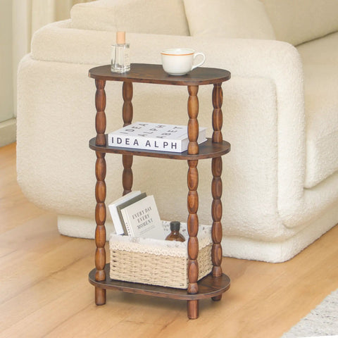 Three Tier Narrow Side Table With Storage For Small Spaces beside couch, holding cup, book, and basket, rustic brown finish