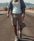 Heavy Duty Bad Boy Hard Case For Garmin Xero C1 Pro And Xero C2 Chronograph In Bright Orange held by a person on a road.