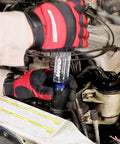Mechanic using Combustion Leak Detector For Engine Block Leaks And Blown Head Gasket Tests Plastic And Rubber Test Kit in engine bay