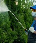 Person using a sprayer wand kit with three nozzle types adjustable stainless steel fan and 3 hole nozzles brass barb fittings
