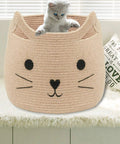 Kitten sitting in a large cotton rope storage basket with cozy cat face design for towels, blankets, toys, and clothes, 15x14 inches