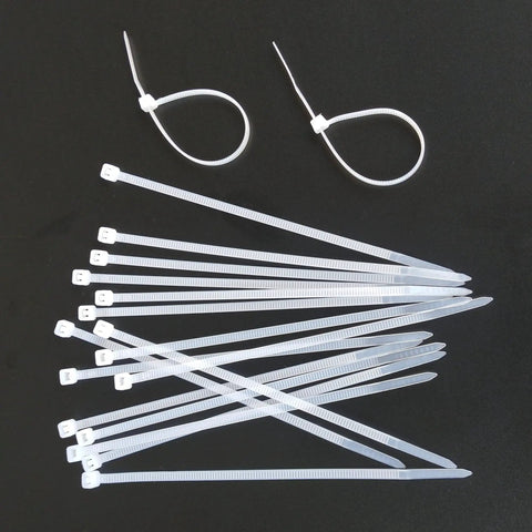 Heavy Duty 4 Inch Cable Ties 500 Pack With 40 Lbs Tensile Strength UV Resistant Self Locking Nylon Zip Ties arranged on black background