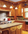 Wooden kitchen with Six Pack Antique Brass Cabinet Pulls and Drawer Handles, Six Point Three Inch Center To Center installed.