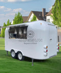 Custom Stainless Steel Food Truck Trailer With Turnkey Kitchen Setup For Mobile Coffee Or Hot Dog Business Built Heavy Duty To Level Up Your Street Vendor Hustle Today, featuring large serving window and lights.