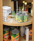 Clear Plastic Quarter Wedge Bin Fits Tight In Corner Cabinets Boosts Space with jars and cans in organized pantry.