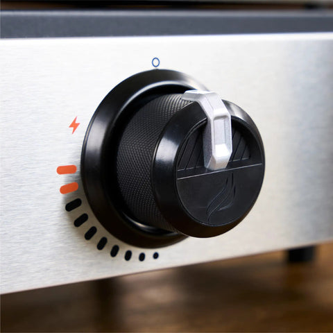 Close-up of the control knob on the Portable 17 Inch Tabletop Griddle With Stainless Front Plate And Powder Coated Steel.